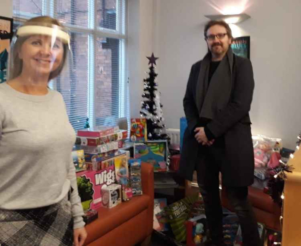 Andrew Luisis of CVS Toy Appeal with Hammond McNulty partner Danielle Sullivan and their in-house toy collection hoping to raise a smile for children on Christmas morning.