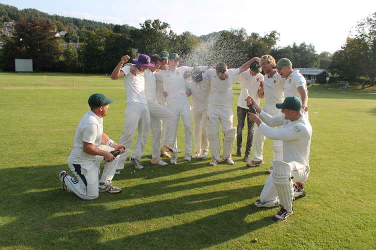 Uplyme celebrate after beating Plymouth CS nd Roborough by nine wickets