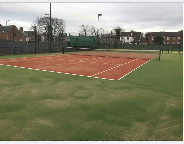 Newly laid Tiger Turf on court four.