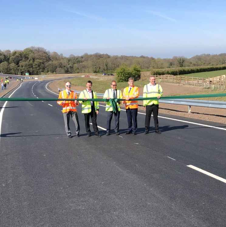 Paul Griffiths (Cheshire East), Alistair Lewis (Graham Construction), Steve Beattie (Graham Construction) Andrew Ross (Cheshire East) and Chris Hindle (Cheshire East) officially cut the ribbon to open the road.