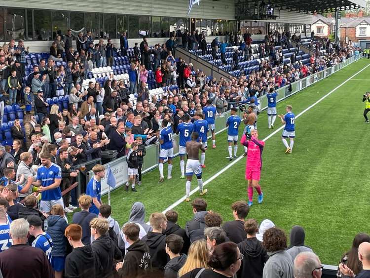 Despite their ground hosting violence, the Macclesfield players still came towards the fans for rapturous applause at the end of their derby day win.