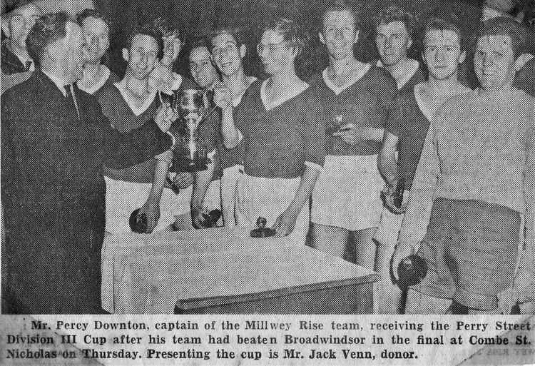 Millwey captain Percy Downton receives the Perry Street Division Three Cup from donor Jack Venn. Cedric Vernon is pictured far right.