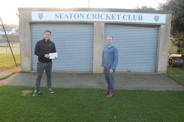 Nub News chief executive Karl Hancock pictured with Steve Batey after presenting a sponsorship cheque for the forthcoming East Devon T20 Bash