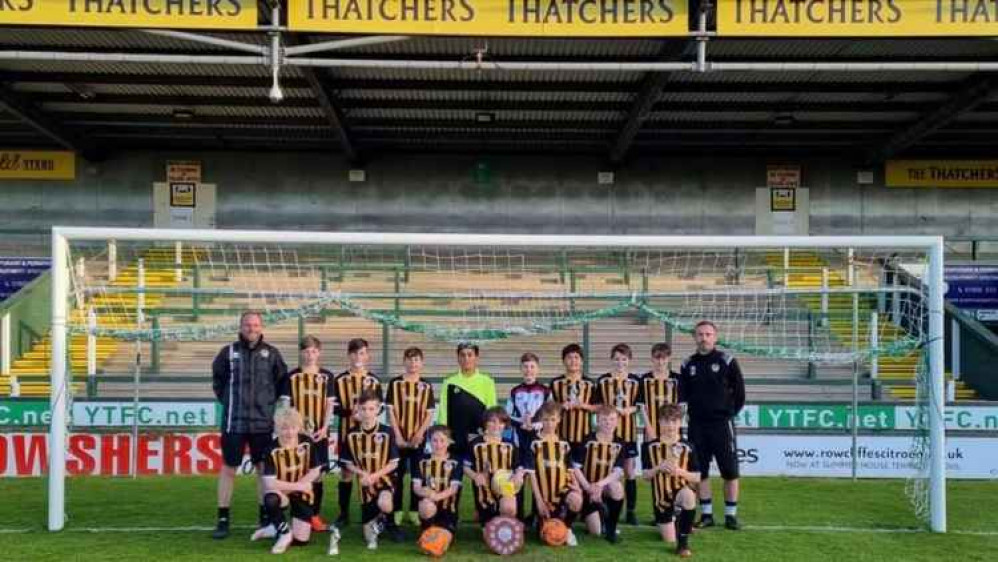 Axminster Town Under 12s line-up before their cup final at hush Park, the home to Yeovil Town
