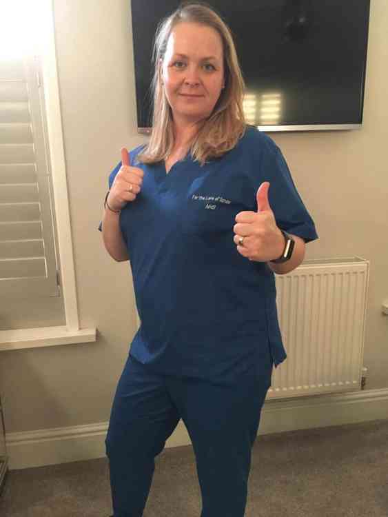 NHS worker Rachel Slater gives her approval for the scrubs.