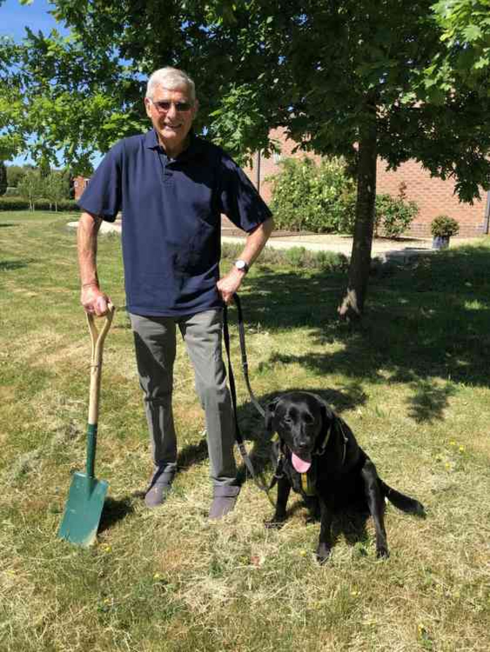 Volunteer Stan Wiseman with his rescue dog Lola.