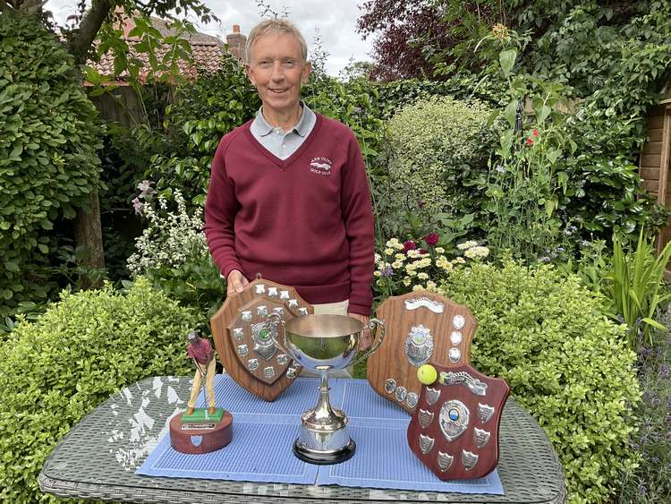 Brian Thompson with his haul of trophies from last year