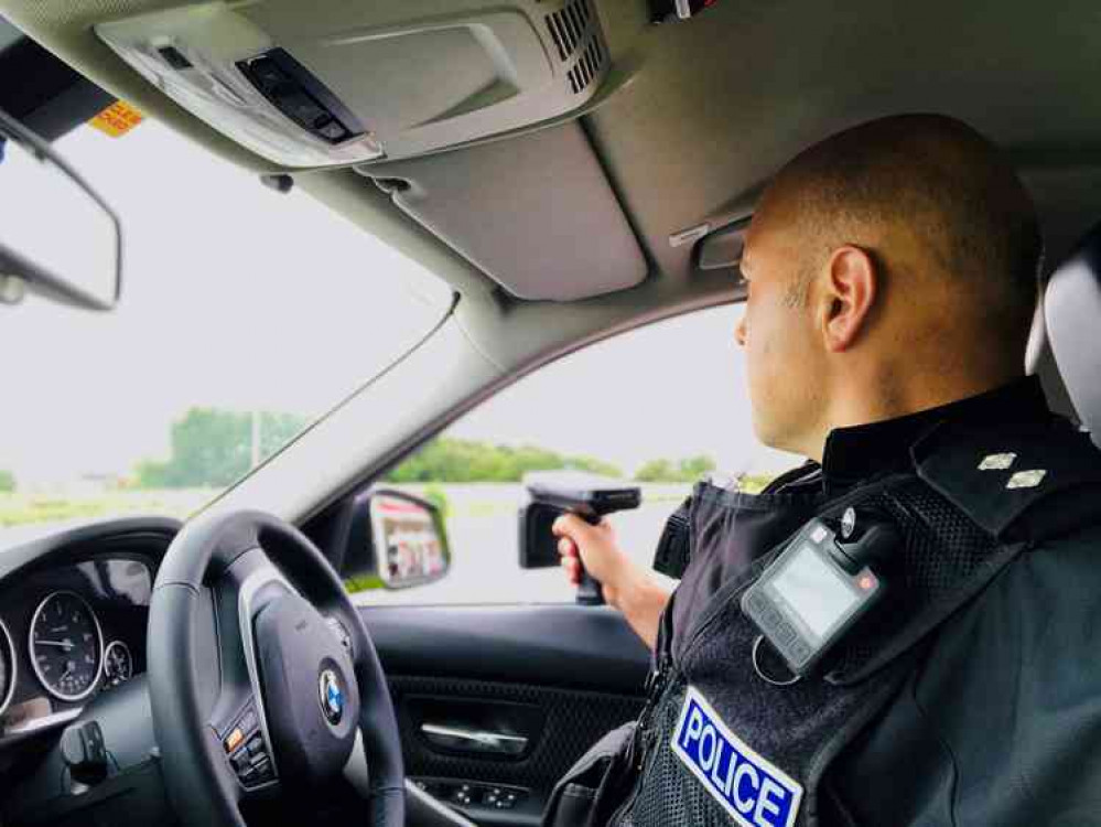 Inspector Anton Sullivan, of Cheshire Constabulary's Roads and Crime Unit, using a VIN CHIP scanner