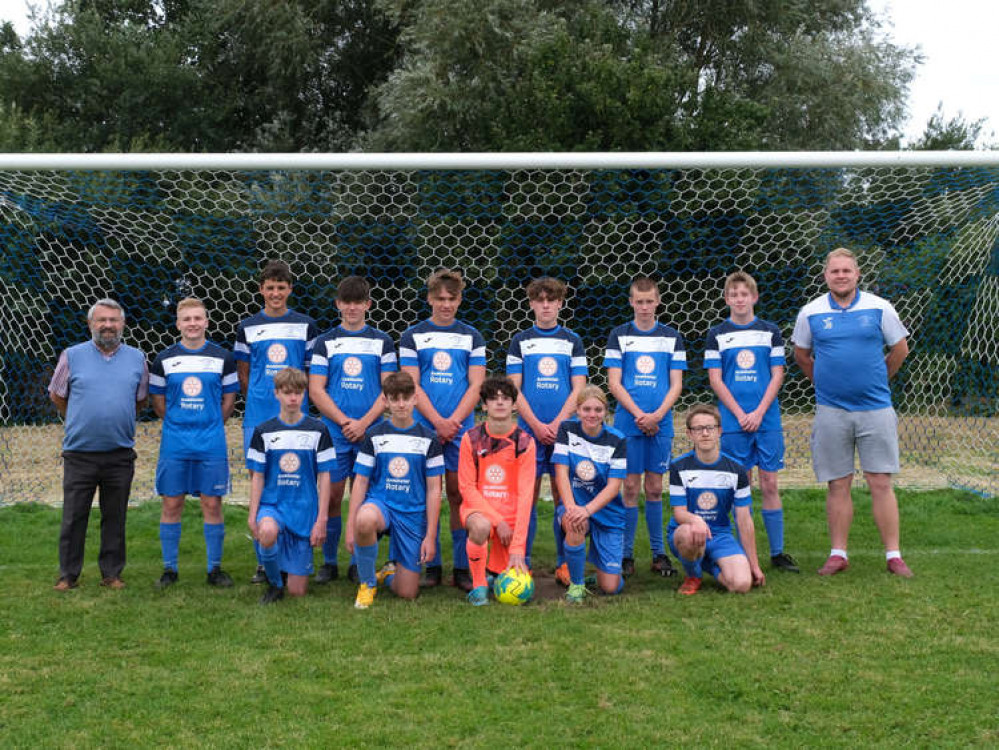 The Millwey Rise Under 16 football team team sporting their new shirts presented by the Rotary Club of Axminster.   From left to right back row : Jon Campbell-Harris (Rotary President); Joe Osborne; James Edginton; Leon Gage Wilkes; Will Reid; Will Lees;