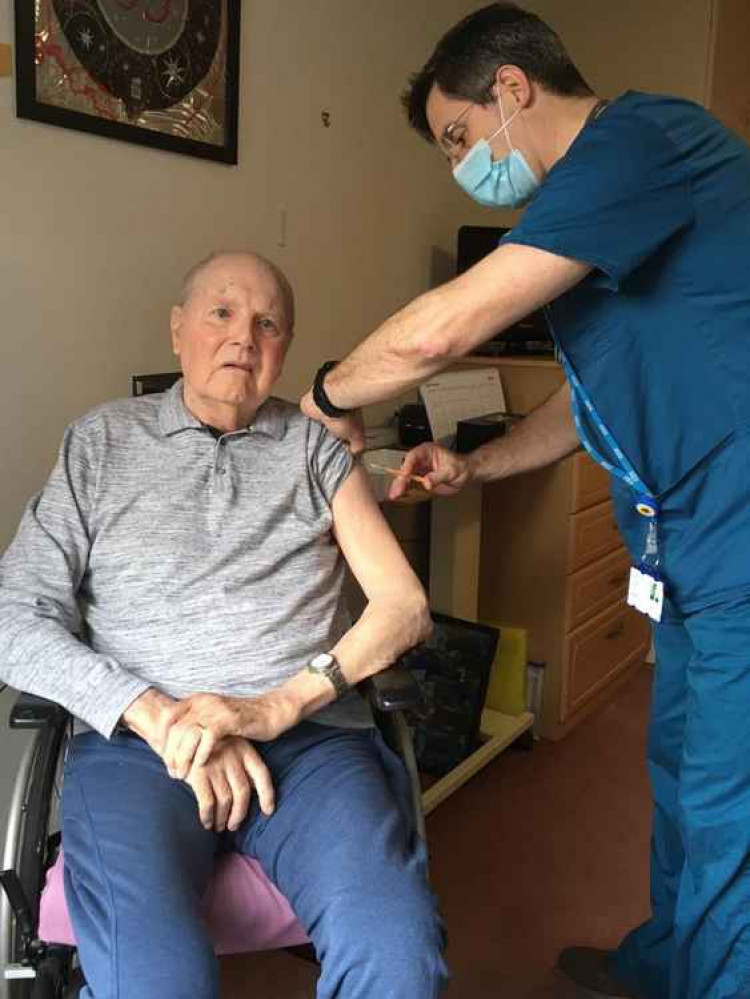 Bryn Hardy, 89, at the Belong Care village was among those to get the jab.