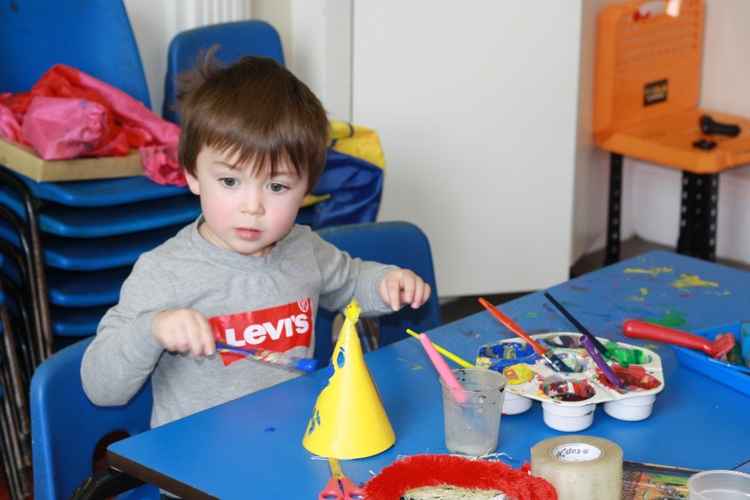 Elijah making his hat for Wear a Hat Day.