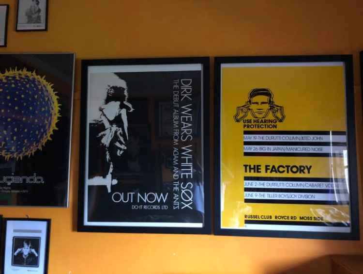 The poster (right) currently resides in the seller's home. (Credit: RockPosterTreasures)