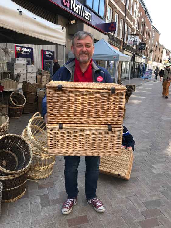 Sandy with his purchases from the Treacle Market. He wants to support the high street by reducing the speed limit in town, and by generally being cleaner, safer and greener.