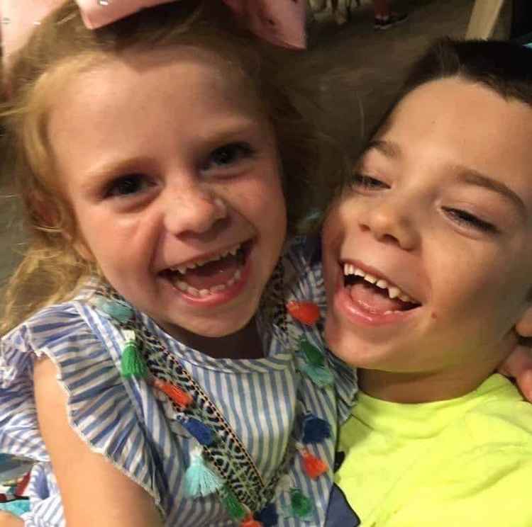 Tess' friends Ollie and Amelia suffer with CLN2 Batten disease - which worsens the with vision, movement, and thinking ability of children. (Image - Lucy and Mike Carroll)