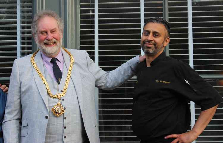 Mayor Cllr David Edwardes with Macclesfield restaurant owner Rav Khangura.