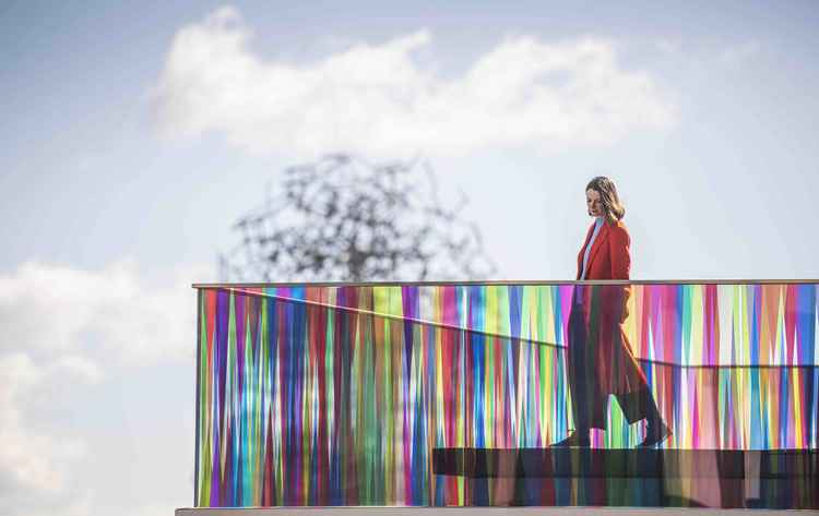 Artist Liz West, will be showing her work Presence at Barnaby Bright. Pictured here at her work Hundreds and Thousands commissioned by Greenwich Peninsula. (Photo by Charles Emerson).