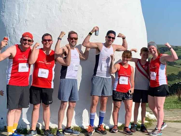 If you want to train for the event, Matt's Rundamentalist Run Club sessions have restarted this week at Crossfit Silk Macclesfield from Lowe Street, and they go running around town such as at Park Green. Here is Simon and Matt (centre) atop White Nancy,