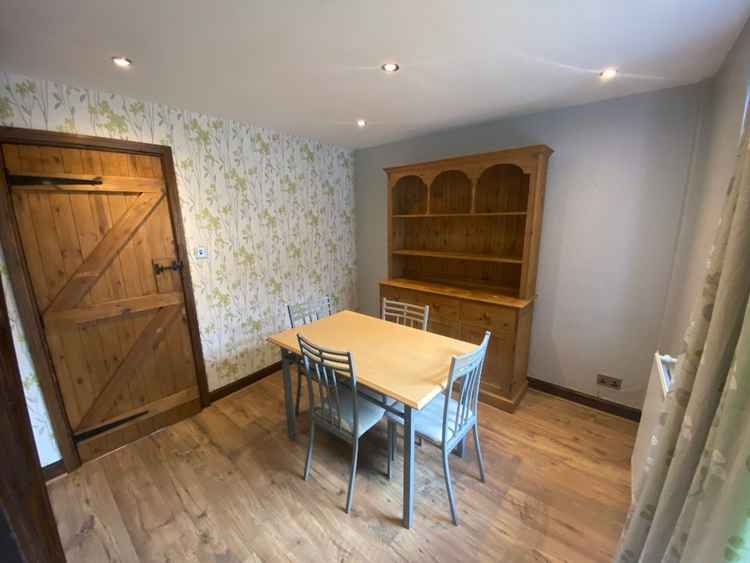 The dining room sits four, in this three bedroom £775 pcm property. (Image - Belvoir Macclesfield)