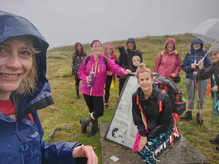 The Bolly fundraisers up on the Trig. They raised almost £1500 in vital running costs for the Bollington community charity.