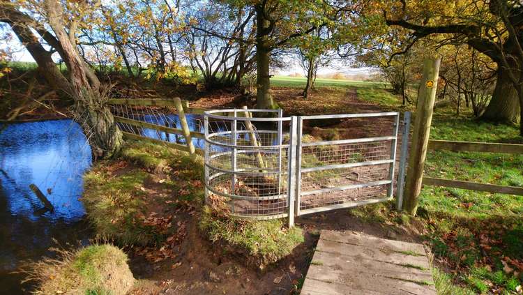 This stile in Poynton has been reinforced with a metal gate.