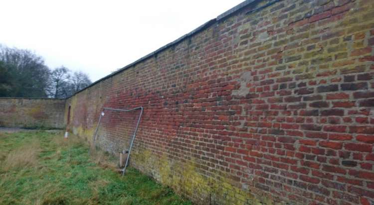 The old walled garden and kitchen garden wall at Alderley Park. It will remain as part of the plans.