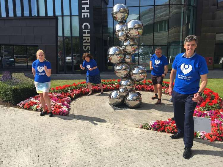 Team members Tracy Iles, Bernie Delahoyde, Ranald Mackay and Stuart Keen outside The Christie.