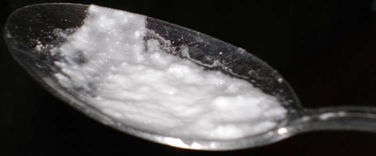 A spoon containing baking soda, cocaine, and a small amount of water, which will be less of an occurrence on our streets now that four crack cocaine dealers are arrested. (Image CC - Unchanged Korwin)