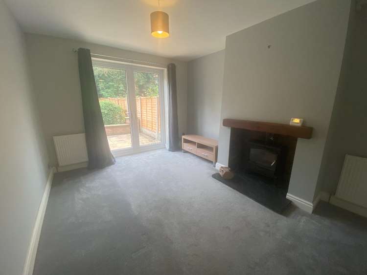 A large dining room and bright lounge (pictured) are on the ground floor of this Macclesfield home.