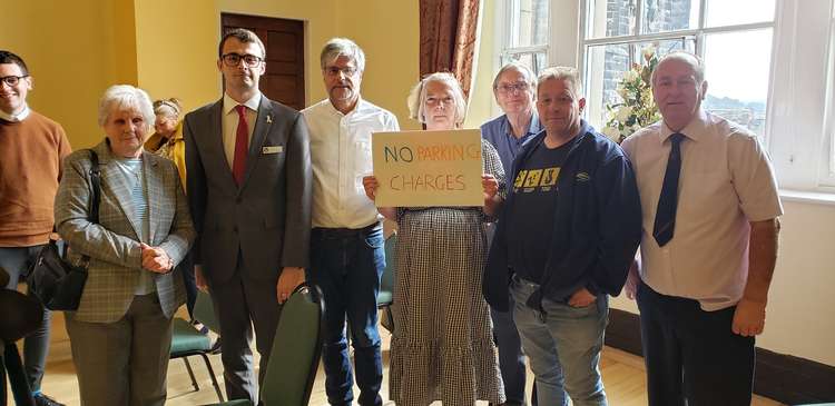 Middlewich councillor Mike Hunter and members of the public celebrate at Macclesfield Town Hall after the Highways Committee voted against Cheshire East's plans to get rid of free parking in smaller Cheshire East Towns.