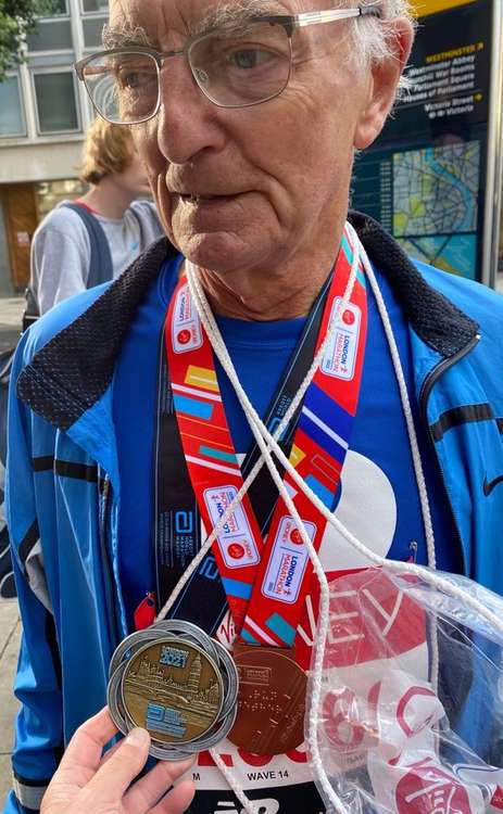 Harry with his London Marathon medal. He'll take on the Manchester Marathon this weekend.