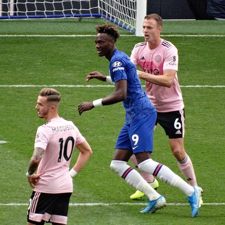 Johnny Evans (right) with current Leicester teammate James Maddison (left) and Chelsea's Tammy Abraham (centre). (Image - CC 2.0 @cfcunofficial (Chelsea Debs) London Unchanged bit.ly_3FHnPWn)