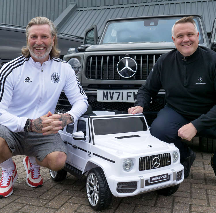 Robbie Savage and Martyn Webb with the LSH Auto tiny car. (Image - Anna Thomas)