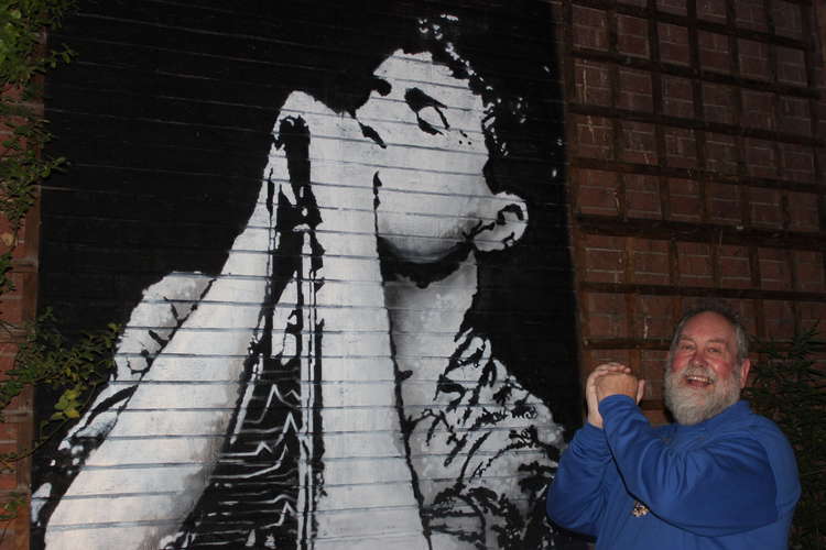 Macclesfield's Mayor Cllr David Edwardes with the incredible Ian Curtis mural in Proper Sound's courtyard. Cllr Edwardes also serves as the Chair of Cheshire East Council's Licensing Committee, playing a small part in Proper Sounds opening. 