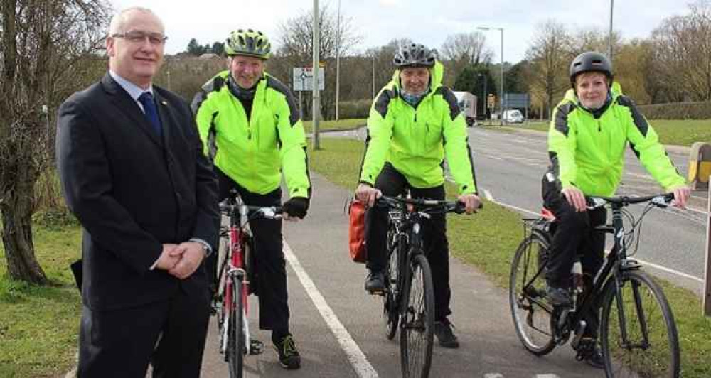 Photo caption: Cllr David Williams with Bikeability instructors and cyclists, Keith Powell, Trevor Craven and Rosie Hunt.