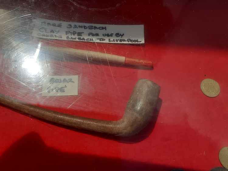 Clay pipe and briar pipe