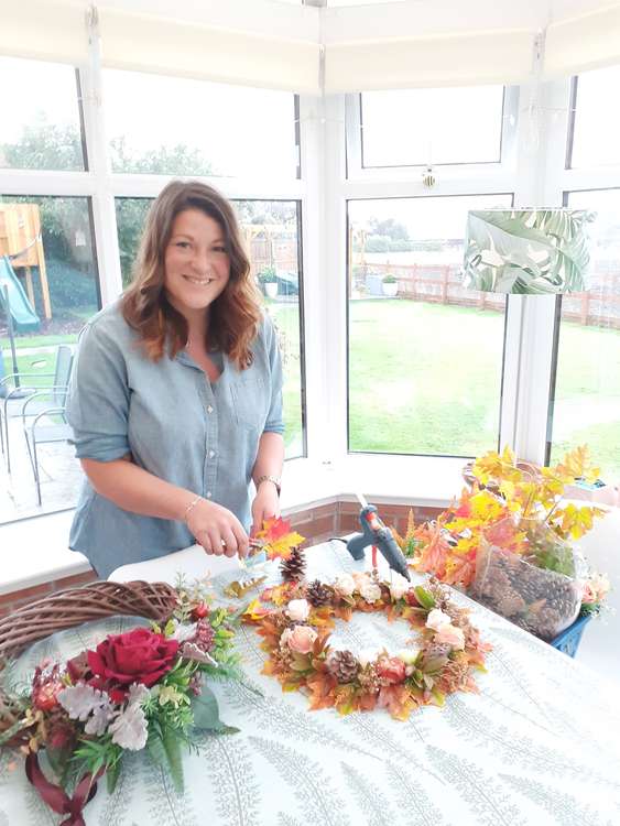 Helen at work on one of her door wreaths