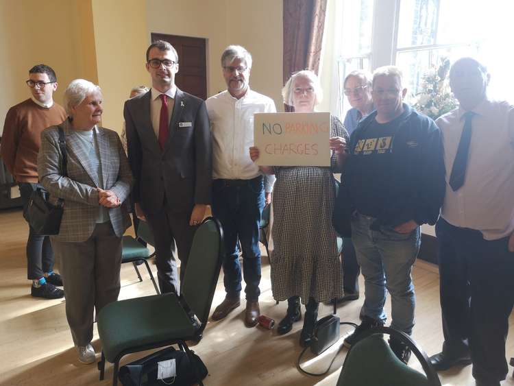 Middlewich councillor Mike Hunter and members of the public, including a Sandbach resident,  celebrate at Macclesfield Town Hall after the highways committee voted against Cheshire East Council's plan