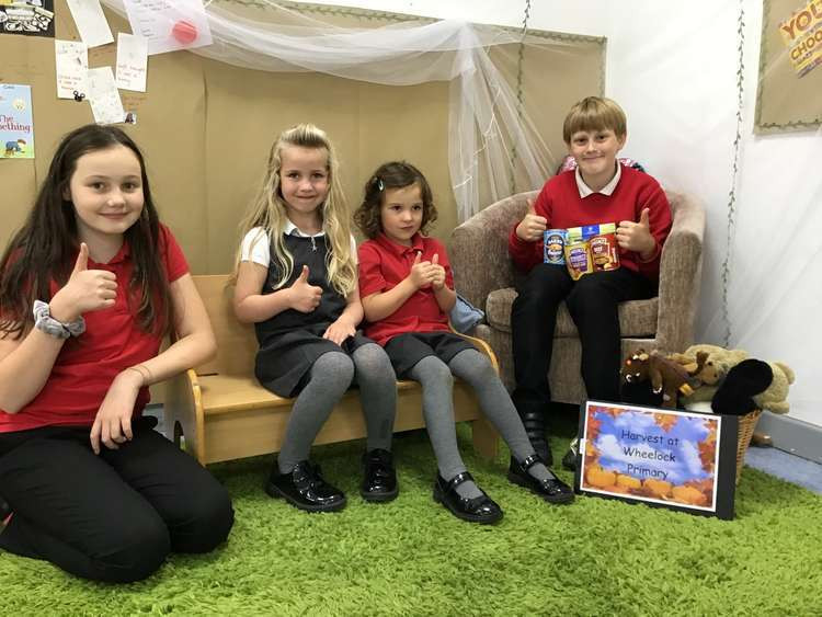 Pupils at Wheeock Primary School get ready for the harvest festival (Picture: Rachael Rivers of The Learning for Life Partnership).