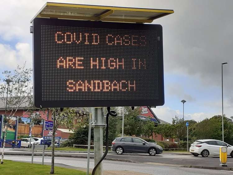 Signage greeting motorists travelling through Sandbach