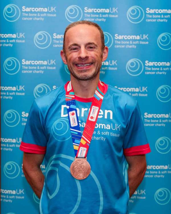 Darren with his London Marathon medal