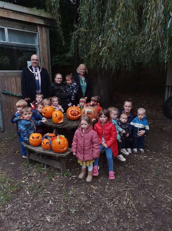 Sandbach Mayor Cllr Price Jones and Christina Price Jones with staff and children and some of the entries