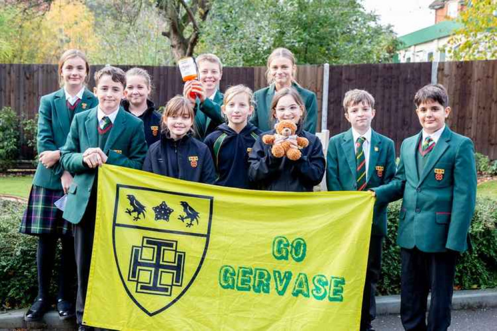 Year 7 Gervase students proudly holding their House flag