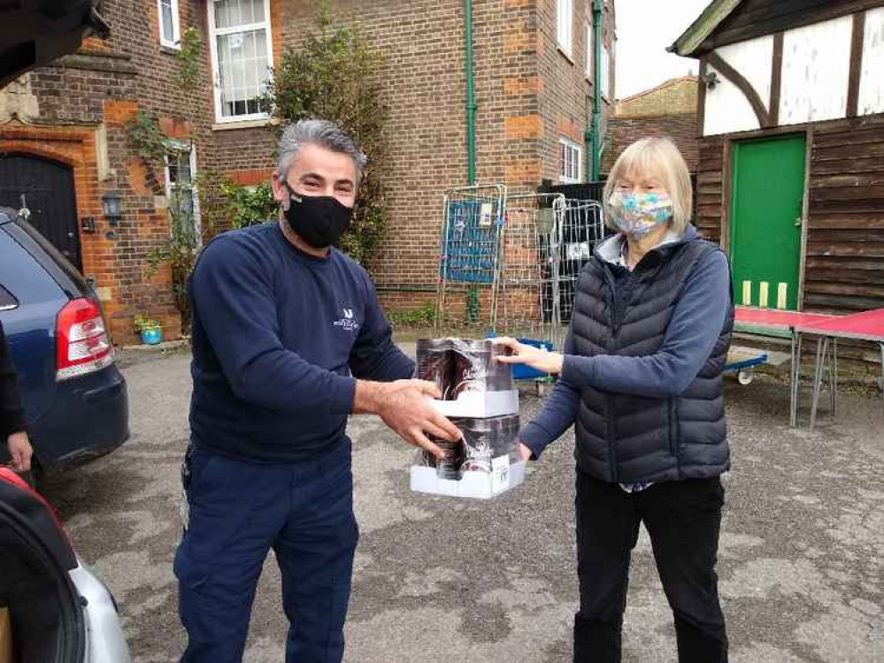 Ealing Foodbank volunteers, Hilary Padmore and Carlos Goncalves