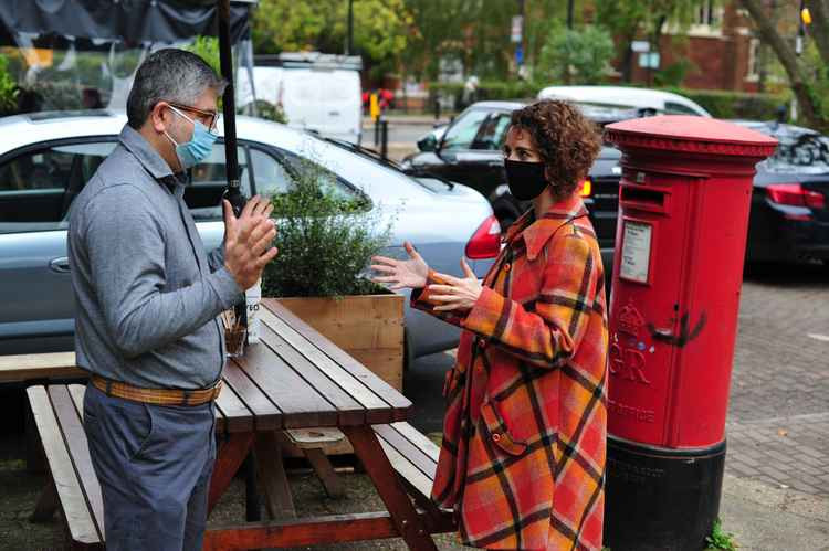 Luisa Porritt talking to a local business in Ealing