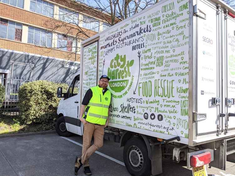 Andrew Mcleay with one of City Harvest's donated vans. Image Credit: Anahita Hossein-Pour