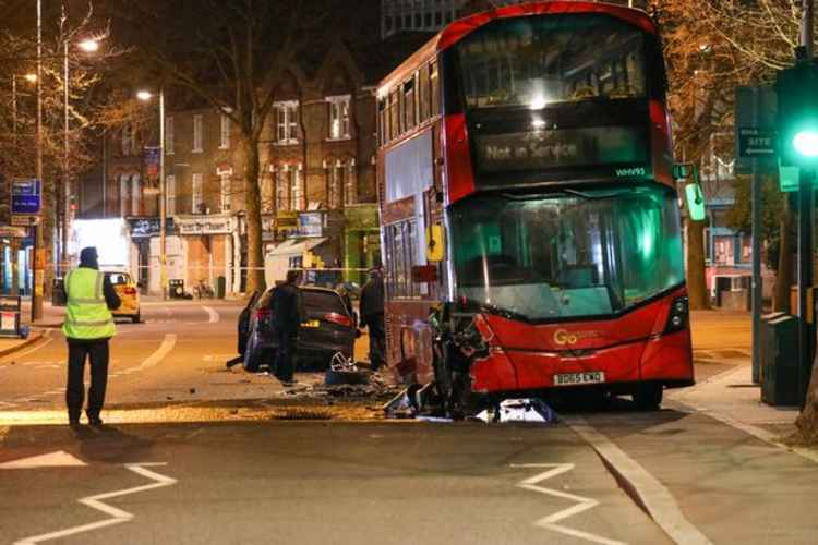 A man was freed from the car by emergency services and taken to hospital. Image Credit: UkNewsinPictures