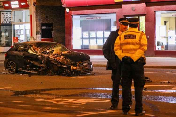 The car has sustained heavy damage on the driver's side. Image Credit: UkNewsinPictures