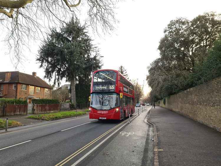 The 65 on its way to Ealing going past Kew Gardens in 2021