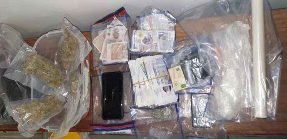 The cannabis and cash seized from the two men. Image Credit: Ealing Police