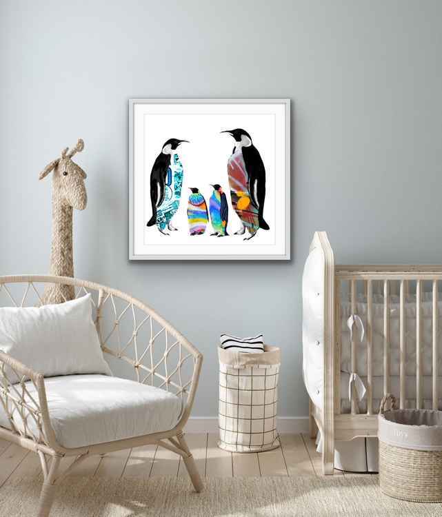 A painting of a colourful penguin family on a white background, on display in a home